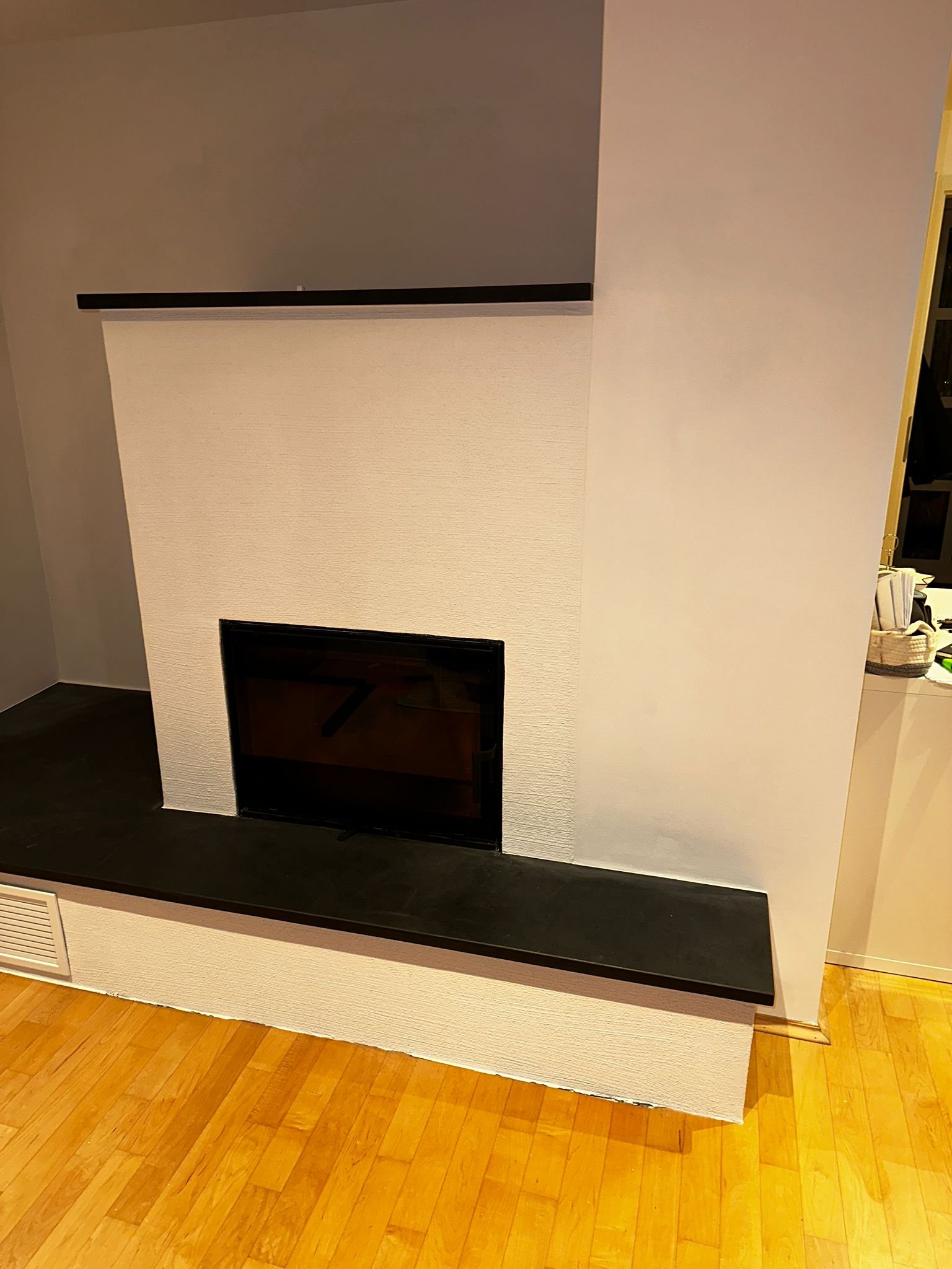 Kaminverkleidung Wiesbaden, neu verkleideter Kamin – ACG Bausanierung GmbH